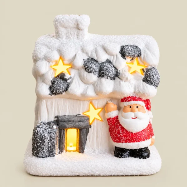 Snow-Covered Santa Christmas Cottage with Star Cutouts – Miniature Tabletop Décor